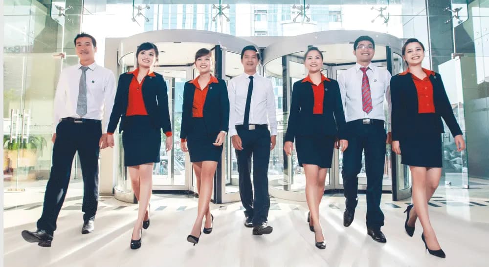 May đồng phục sơ mi công sở: vải, cổ áo và đường may